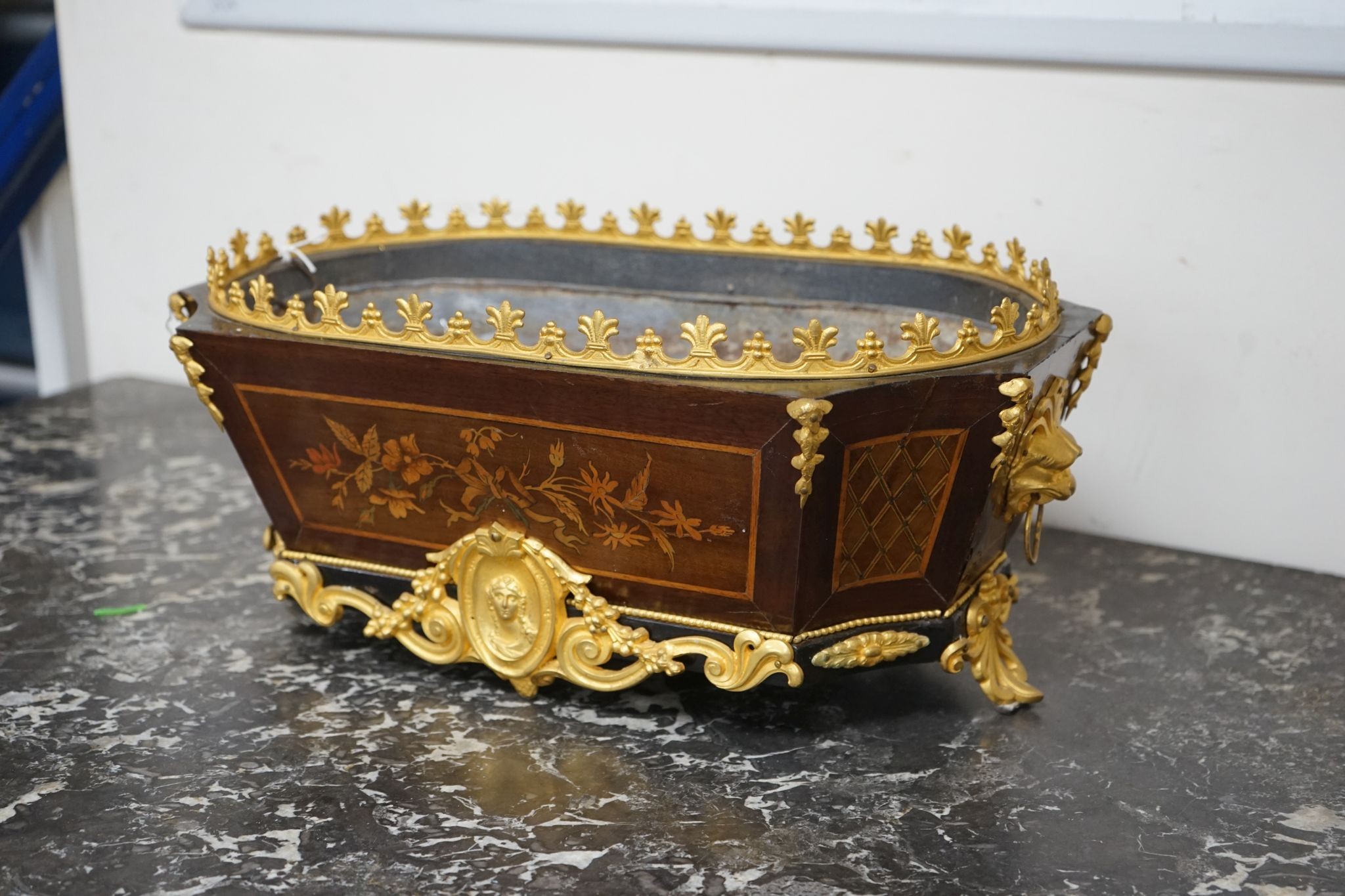 A French gilt metal mounted marquetry inlaid jardiniere, width 44cm, depth 25cm, height 19cm